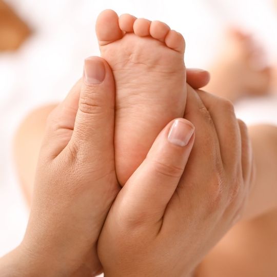 Baby Massage small People in a workout class lunging and holding weights.